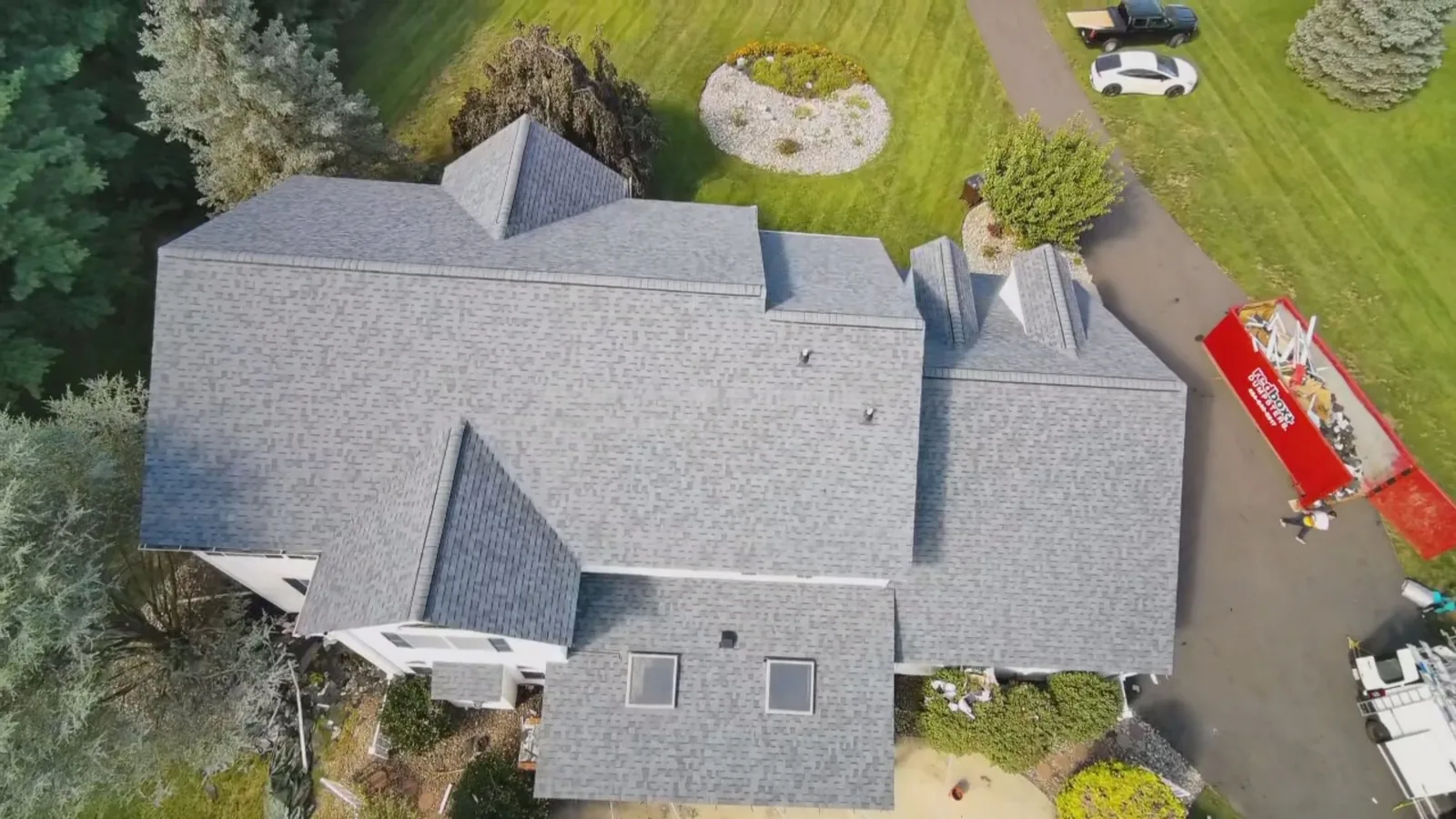 Top-down aerial of a full Owens Corning Duration Harbor Blue roof replacement on a large home in Nazareth, PA by LV Roofing & Siding